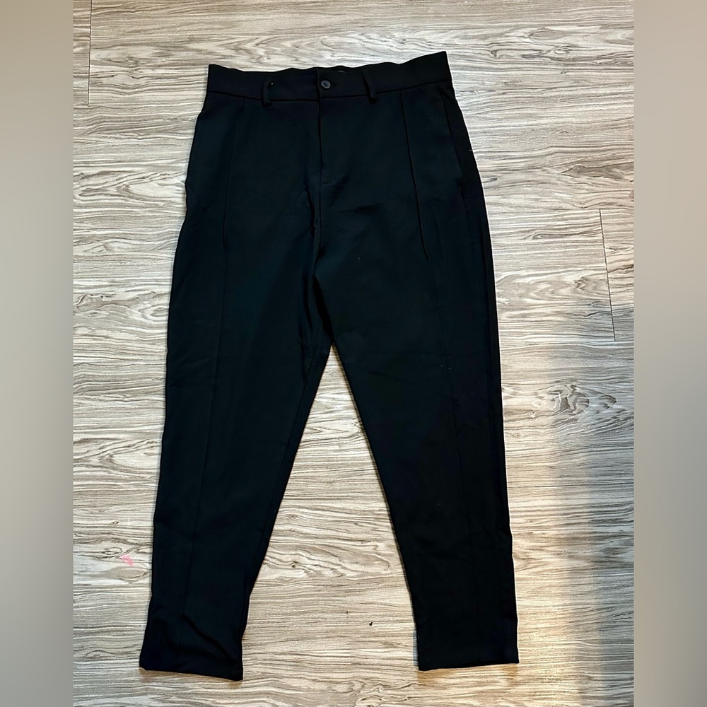 Black slacks with long belt